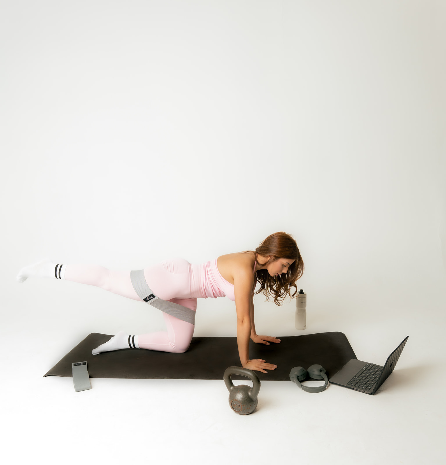 Personal trainer Luisa demonstrating fitness exercises